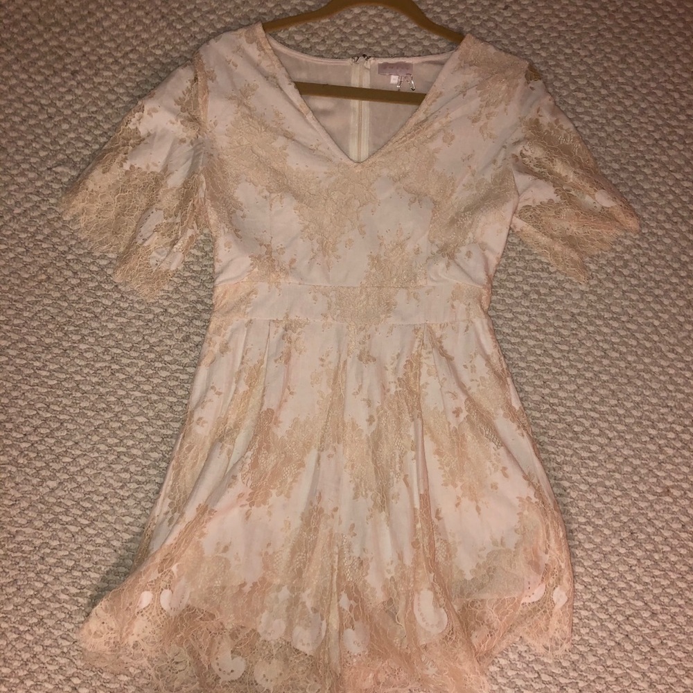 Cream colored lace romper